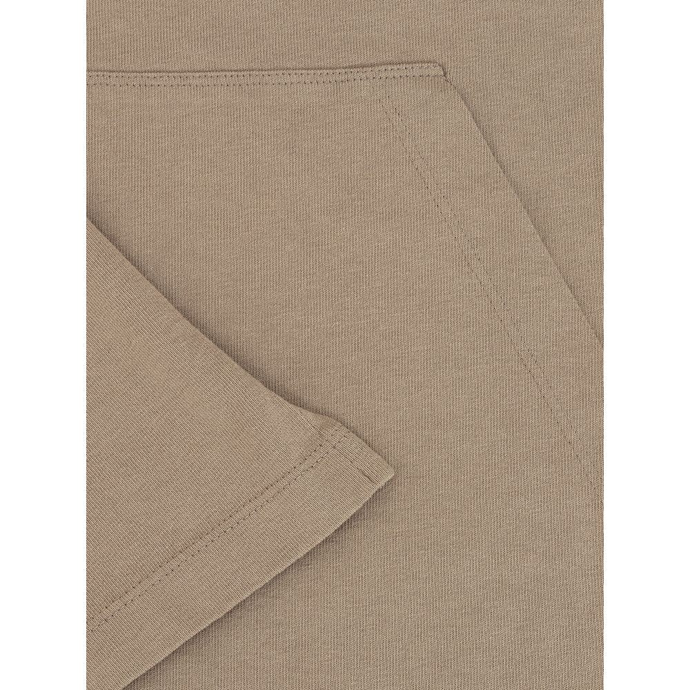 Close-up of the Dsquared² Beige Cotton T-Shirt showcasing the sleeve and front pocket detail, highlighting the beige cotton texture.