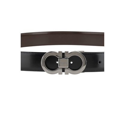 Ferragamo Black Calf Leather Bos Taurus Regular Belt with Gancini buckle, reversible design in black and brown leather, 3 cm thickness.