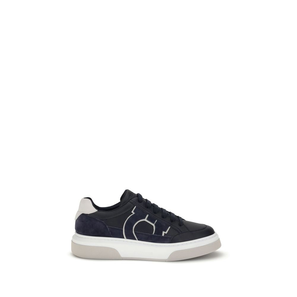 Ferragamo Blue Calf Leather Bos Taurus Low Top Sneakers with Gancini design and textured rubber sole. Stylish retro-inspired footwear.