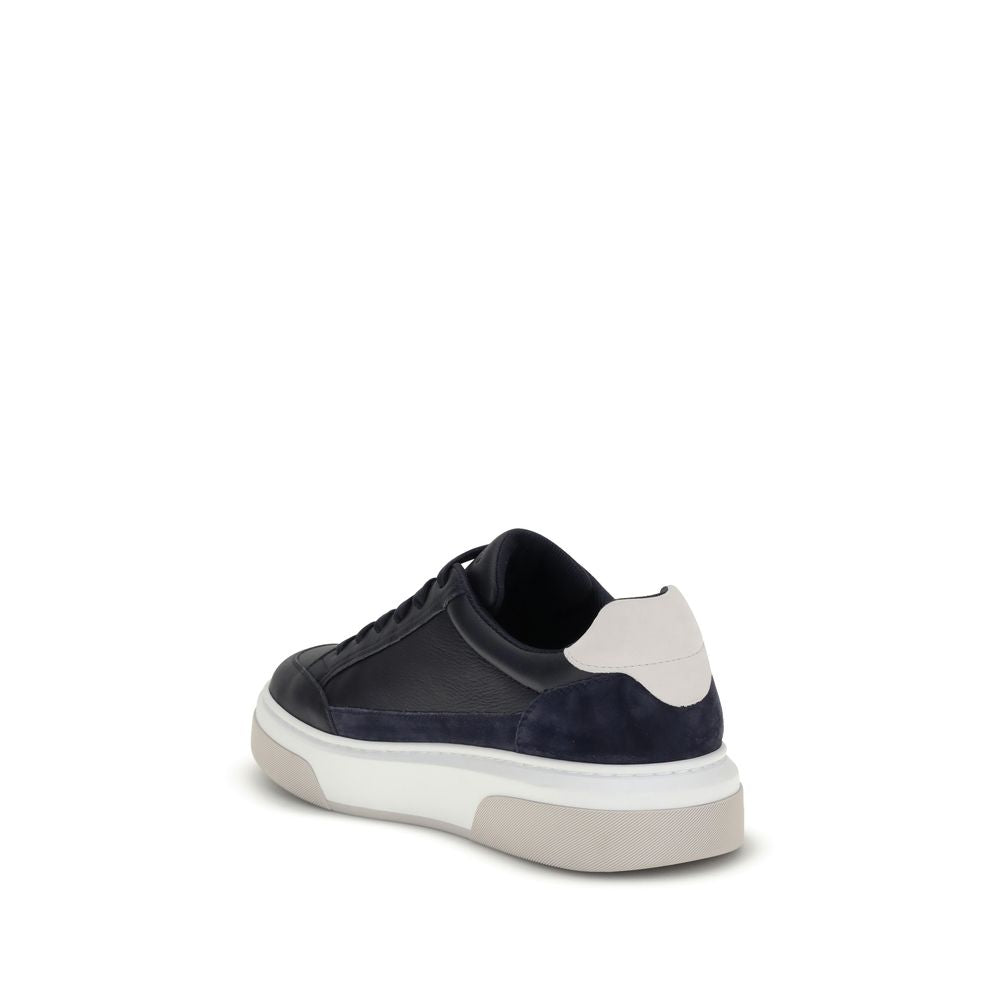 Ferragamo Blue Calf Leather Bos Taurus Low Top Sneakers with suede inserts and rubber sole, rear view showcasing Gancini silhouette.