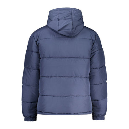 Back view of Fila Blue Polyester Men Jacket with hood, emphasizing the water-repellent fabric and bold blue color.