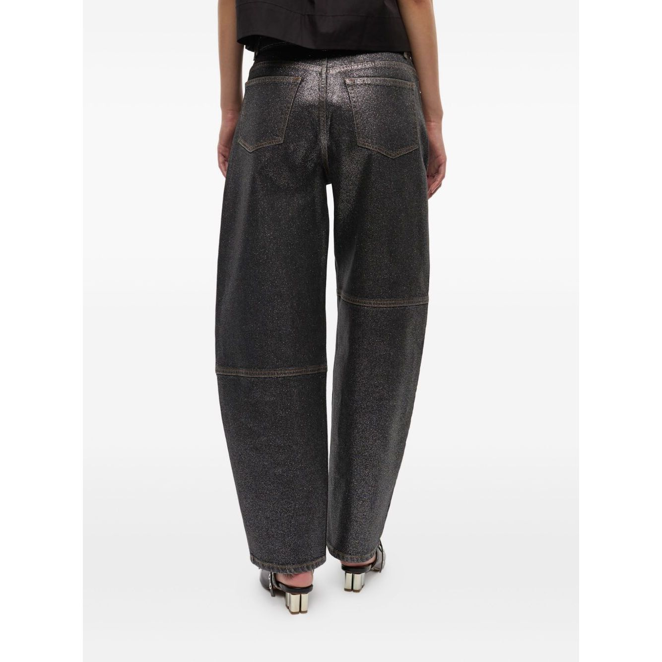 Back view of GANNI Jeans Black with five pockets and belt loops, made from organic cotton denim for a stylish and sustainable outfit.