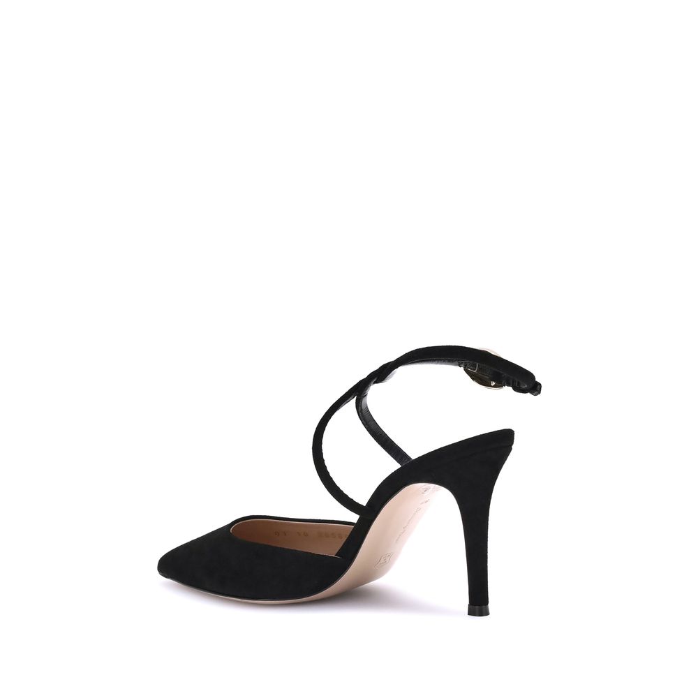 Gianvito Rossi Suede Pums featuring elongated toe, braided strap, buckle with gold detail, and stiletto heel. Made in Italy.