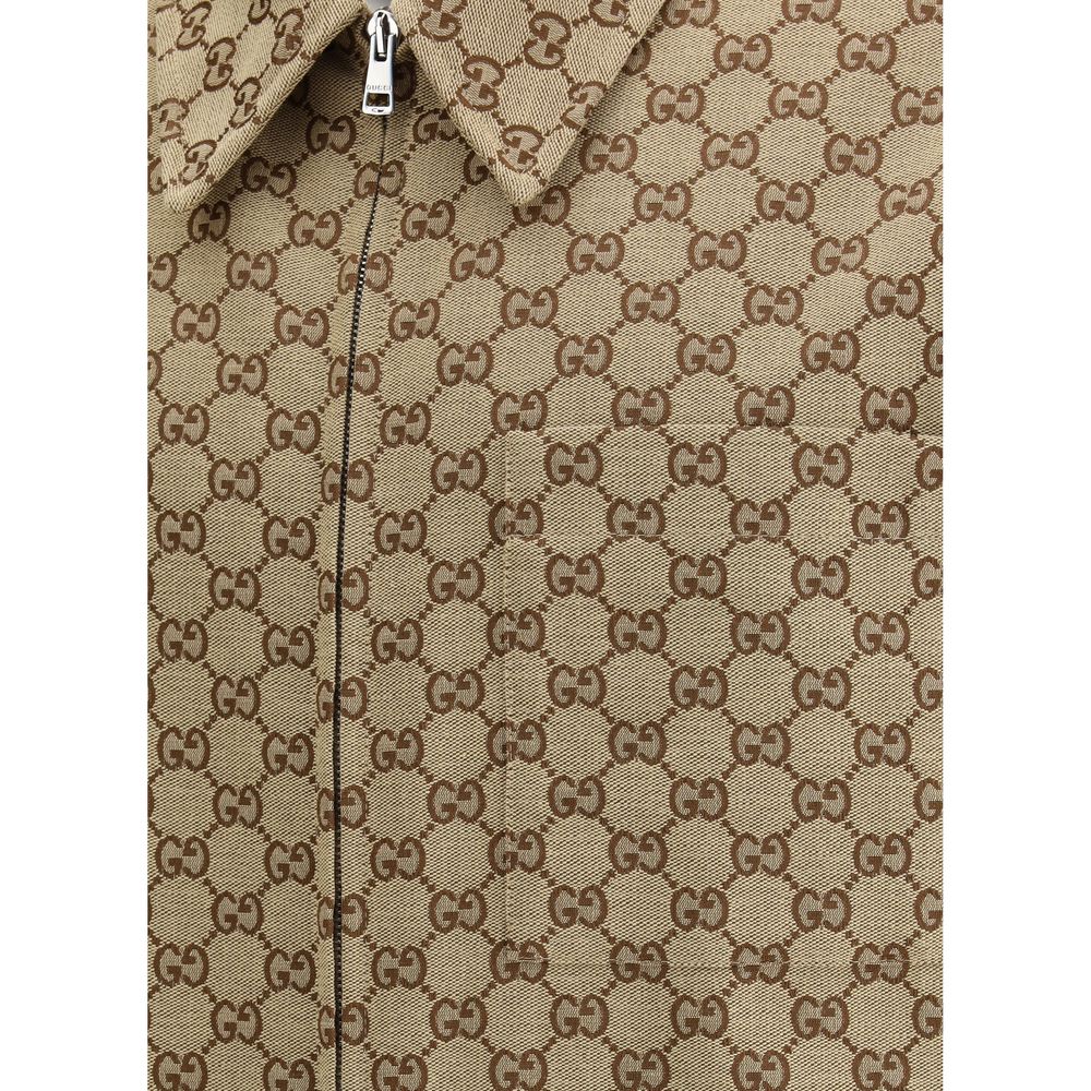 Gucci Brown Cotton Jackets And Coat with GG jacquard texture, zip closure, classic collar, and side welt pockets for a chic look.