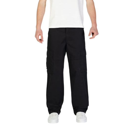 Model wearing Jack Jones Black Cotton Cargo Pants with side flap pockets.