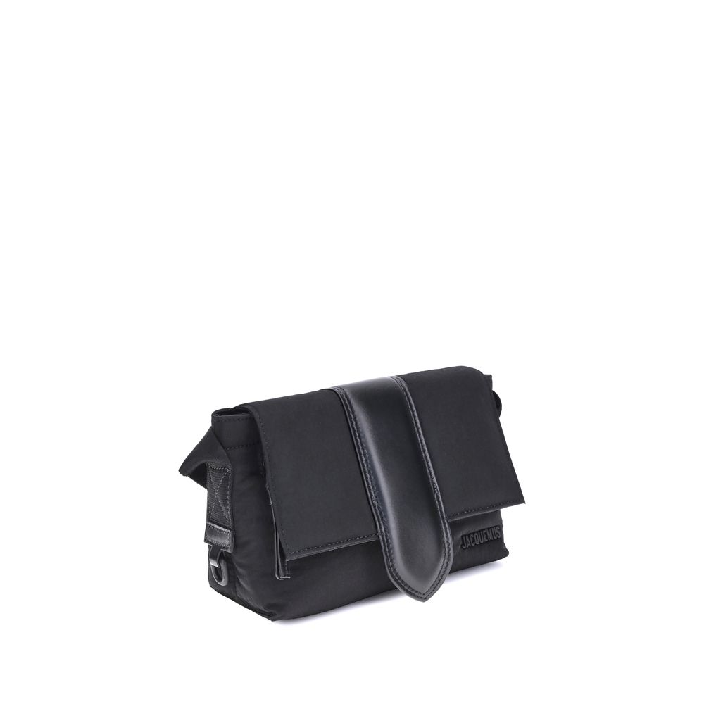 Jacquemus Black Nylon Handbag with leather handle and magnetic flap showcasing elegance and functionality.