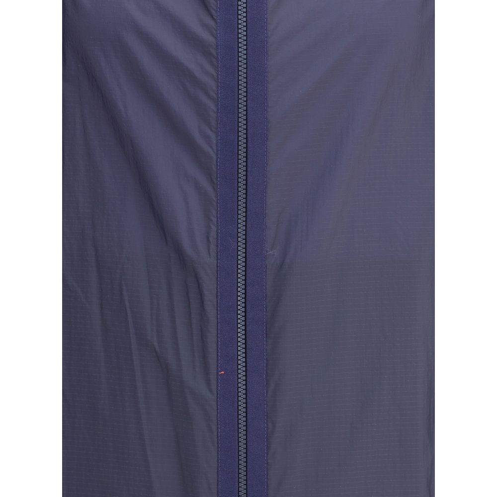 Close-up of Moncler x Donald Glover Blue Nylon Shell Jacket showing ripstop nylon fabric and zip closure.