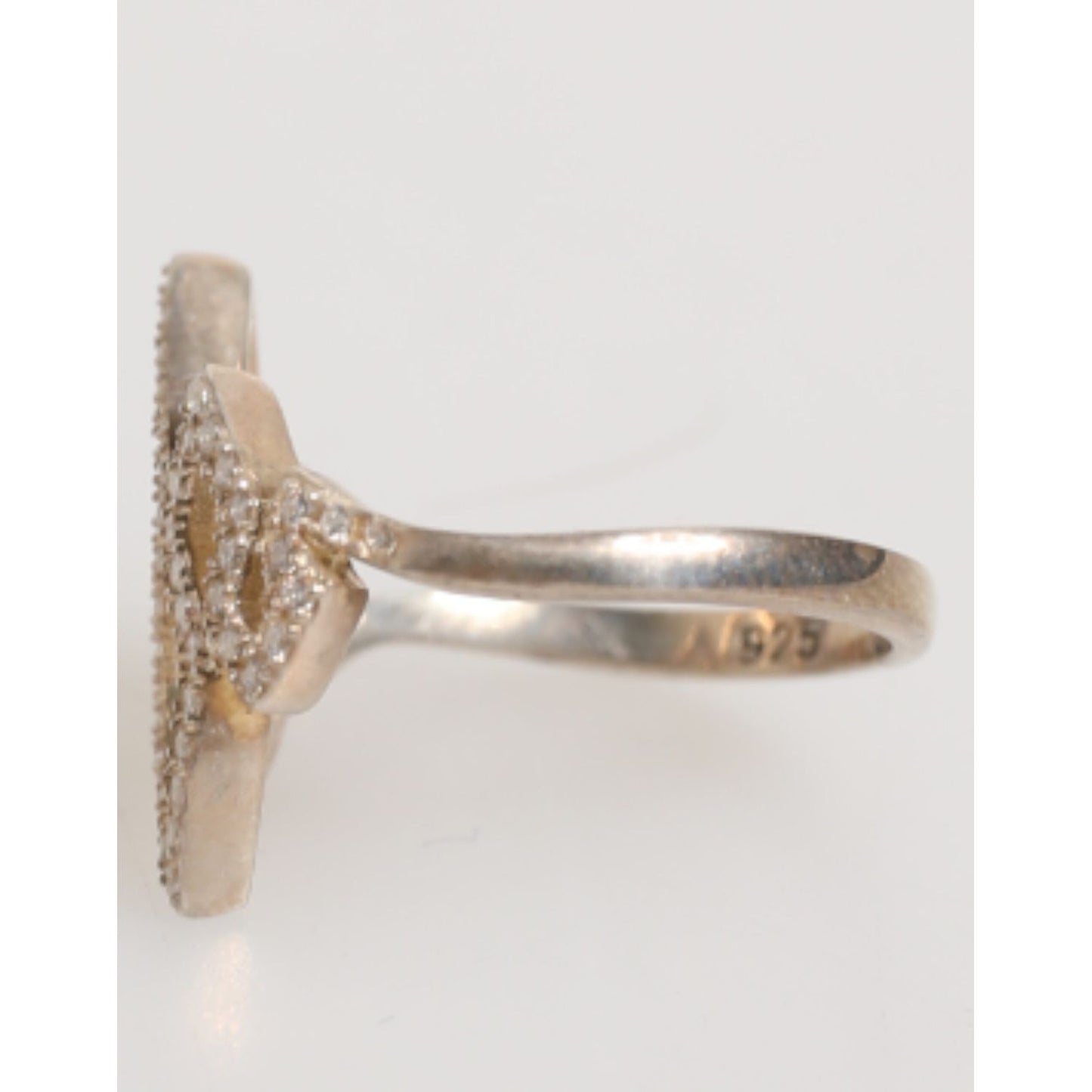 Side view of Nialaya Geometric Diamond Shape Pave CZ Crystal Jewelry Ring in 925 Silver with clear crystals, showcased on a light background.