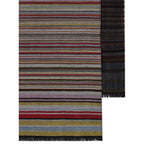 Paul Smith Signature Stripe wool and silk scarf in dark red with frayed edges, showcasing a vibrant striped pattern.