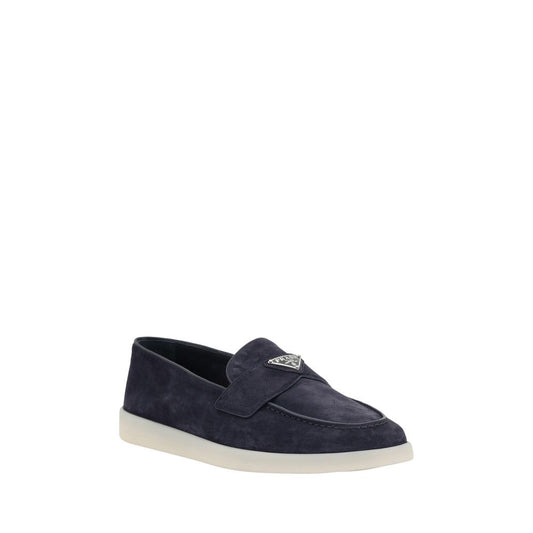 Prada Suede Loafers with triangle logo, rubber sole, elegant design for formal or casual wear, AW25 collection.