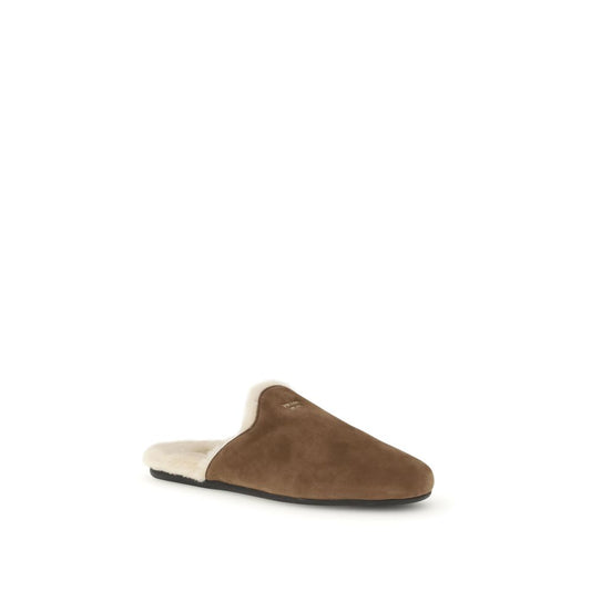 Prada Suede Mules with logo, sheepskin lining, and rubber sole for elegant comfort and durability