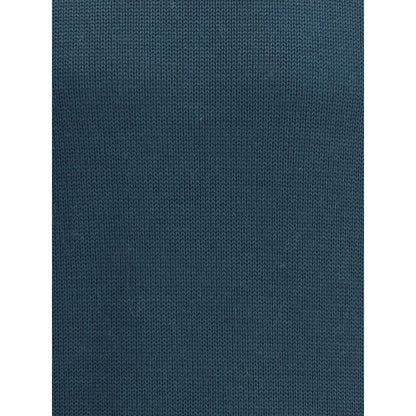 Close-up of Roberto Collina Green Merino Wool Turtleneck fabric showcasing ribbed texture.