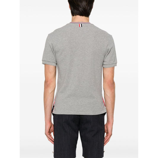 Back view of Thom Browne T-shirts and Polos Light Grey with signature grosgrain side tabs and stripe detailing.