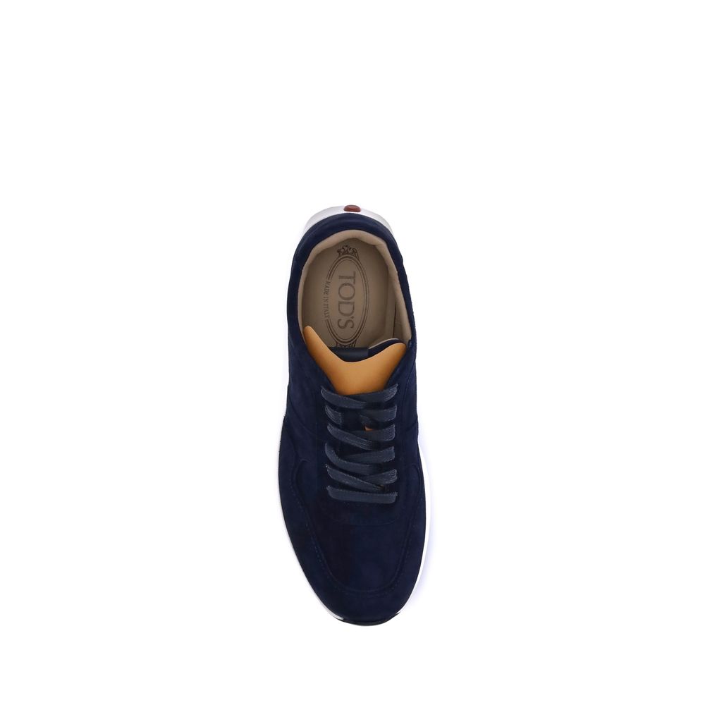 Top view of Tod's Blue Calf Leather Bos Taurus Low Top Sneakers showcasing suede design and Tod’s logo on tongue.
