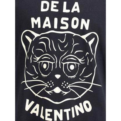 Valentino Black Cotton T-Shirt featuring Le Chat De La Maison graphic on the front, adding distinctive character and casual elegance.