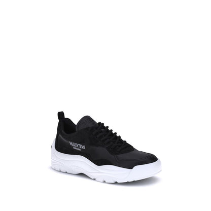 Valentino Garavani Black Calf Leather Bos Taurus Chunky Sneakers with printed logo and VLogo Signature, preformed sole, and lace-up design.