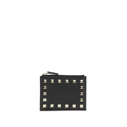 Valentino Garavani Black Calf Leather Bos Taurus Wallet with platinum studs and zippered coin compartment, elegant Rockstud card holder.