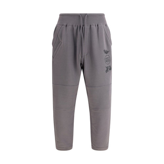 Y-3 Gray Cotton Joggers (Workout Pants) with elasticized cuffs and logo, perfect for a minimalist sporty look, made from 100% cotton.